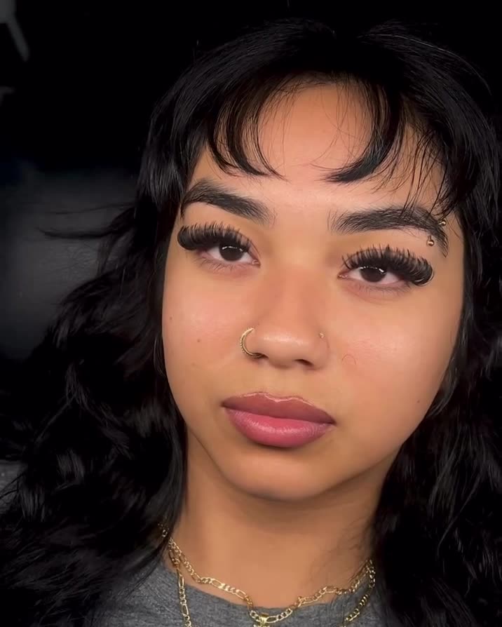 Wispy set on a client with curly bangs