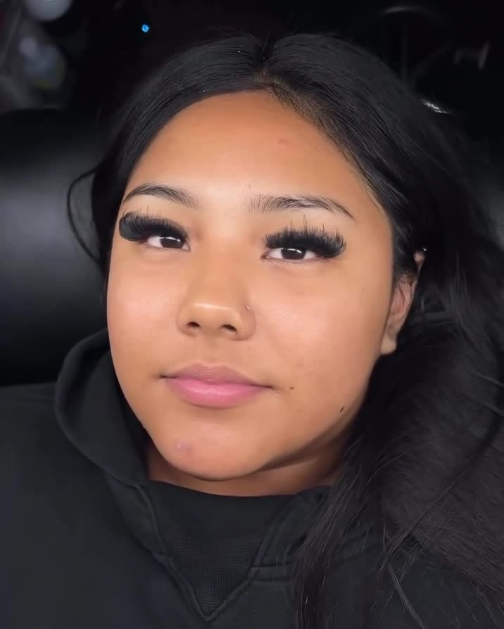 Wet set on a client in a black hoodie